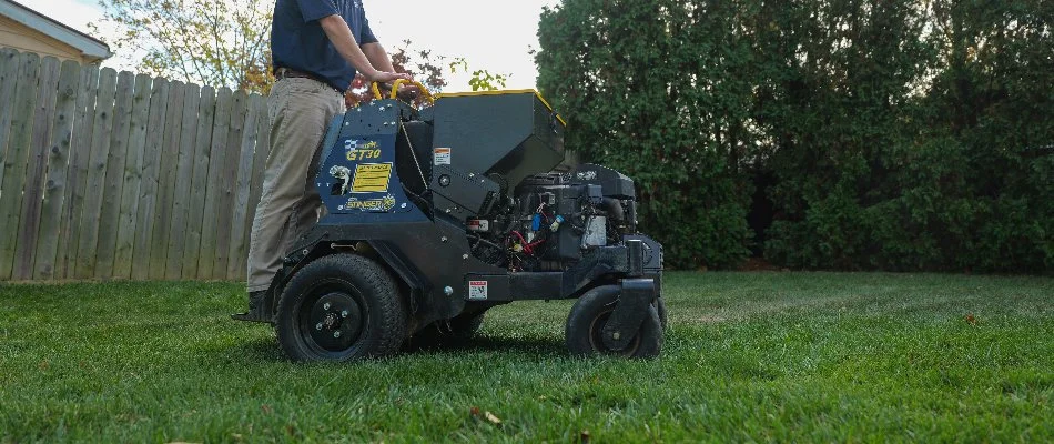 Lawn in Hockessin, DE, being aerated by a tech.